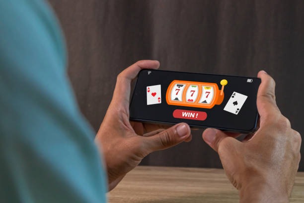 Mobile phone displaying Bali Vacation slot game interface on joinbet88 login platform